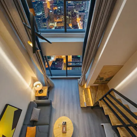 Chongqing Evening Language Loft Duplex Boutique Hotel (Guanyinqiao Longhu Xinyi Street) Отели рядом с достопримечательностью «Чунцинский детский парк»