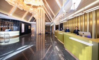 The hotel lobby is modern and spacious at Atour S Hotel Zhongbei Road  Chuhe Han Street
