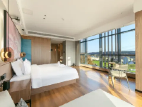Wan'ao Hotel (Lushan Caijiapo High-speed Railway Station) Hotel a Qishan