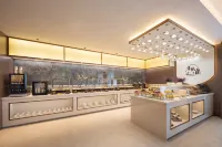Xingyue Hotel (Dashang New Mart Jiamusi Station) - petit déjeuner