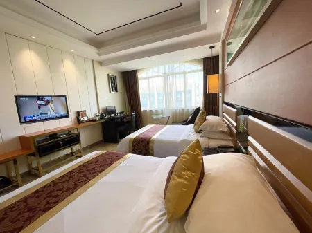 Chengjie Business Hotel (Wanning City Center High-speed Railway Station) Отели рядом со станцией Wanning Railway Station