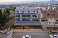 Tanrise City House Hotel di 