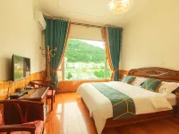 Yuelai Inn Hotel a Heishui