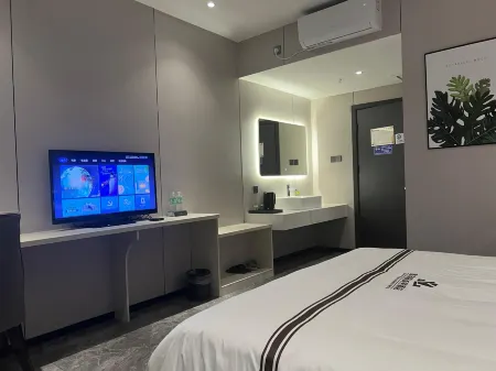 Xinyoulian Business Hotel Отели в г. Юнань