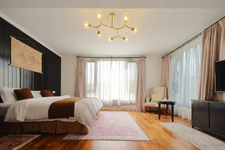 Mijing Homestay (Yinxinghu Amusement Park Sujia Lixiangcun Branch) Отели рядом с достопримечательностью «Datangjin Herb Valley»