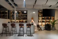 Tengchong Phoenix Terrace · Mengying Wenquan Resort Chinese Inn - bar