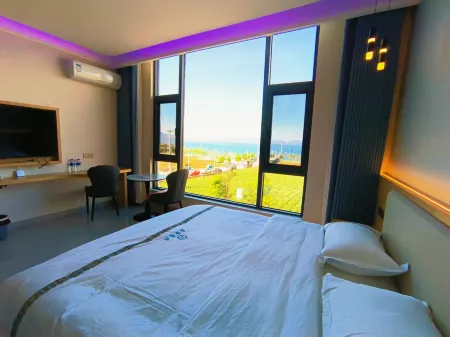 Juyuan Chinese Inn Отели рядом с достопримечательностью «Fuxian Lake Shijia Cherry Blossom Garden»