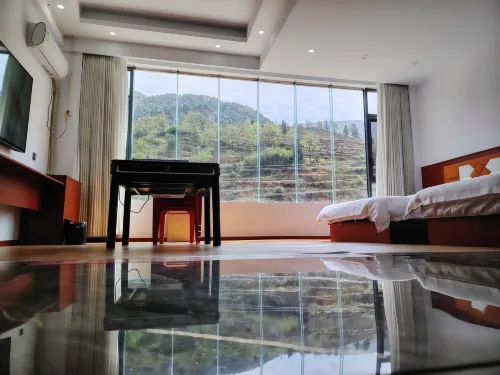 Runchengxiang Homestay (Wumeng Grass Plain)