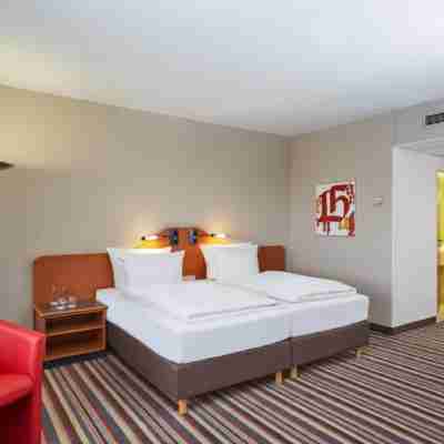 H+ Hotel Leipzig Rooms