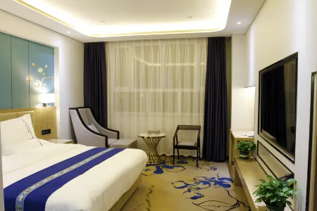 Xinhua Theme Hotel Отели рядом с достопримечательностью «Qinggeli Wolf Mountain Scenic Area»