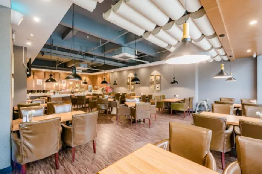 James Joyce Coffetel (Xinyang Xixian Longhu Huayi)