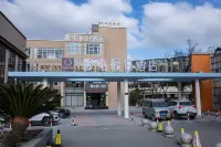 Xintun Holiday Hotel（Shanghai Jiuting Subay Station Branch） โรงแรมในซินซวง, ซิเปา