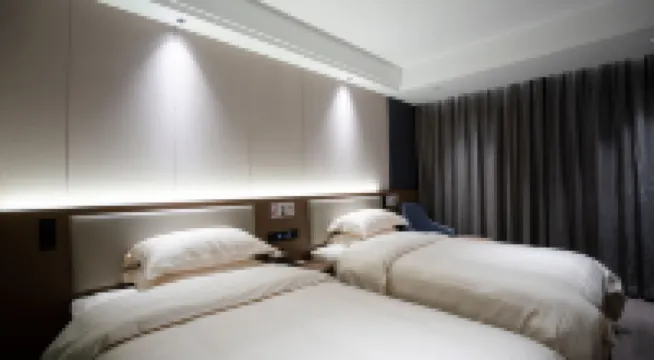 Shenmu Xingdu Houde Hotel