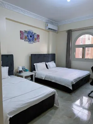 Orange Chinese Hotel Отели рядом с достопримечательностью «Канадский международный колледж - CIC»