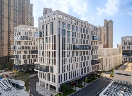 Muxi Hotel (Wuhan Jiangxia Miaoshan Station Store) Отели рядом с достопримечательностью «Wuhan Vocational College of Communication and Publishing»