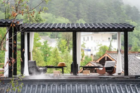 Baoxing Yunshang Xuxi Hot Spring Hotel Отели в г. Баосин