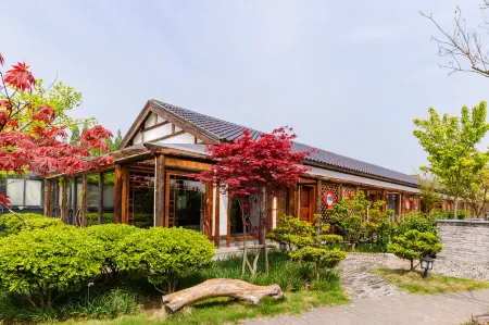 Shanghai Country House Shihu Theme Homestay Отели рядом с достопримечательностью «Xisha Wetland»