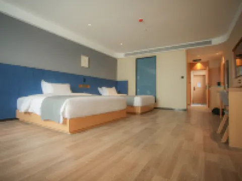 Langou Shangpin Hotel (People's Shopping Mall Shop) Hoteles en Pingyi