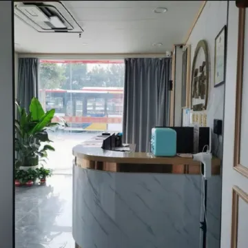 Tian Luo Business Apartment Отели рядом с достопримечательностью «Guangzhou Flying Over the Jungle Adventure Park»