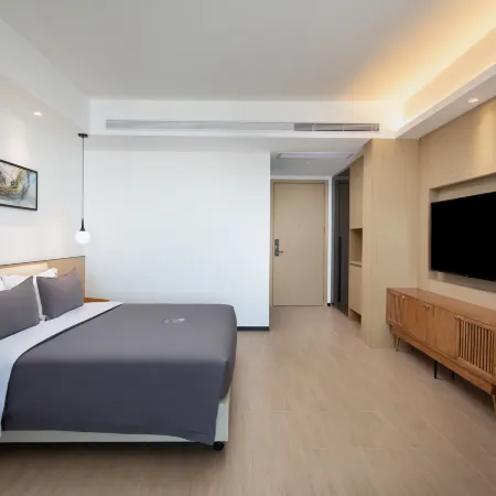 Ramada Encore By Wyndham Jiusuo Down Town Отели в г. Ледун