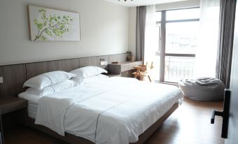 Mangshi Xishang Homestay (Yi Nationality Ancient Town Branch)