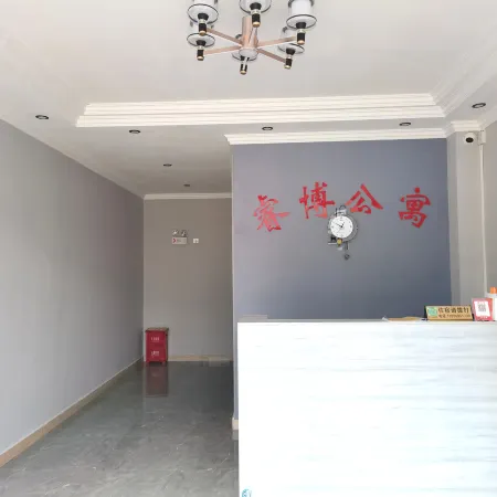 Ruibo Apartment Отели рядом с достопримечательностью «Холл-Стрит Планирование Выставок»