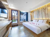 โรงแรมบ่อน้ำพุร้อนฮินดู (สาขาเมืองจิวเวลรีนานาชาติเยาวราช เดอลง เมืองตั่วเป่า) โรงแรมในรุ่ยลี่