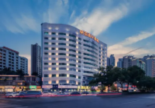 DoALand V Hotel (Wuyi Square Helong Sports Center Branch) Hotels near Tian Xin