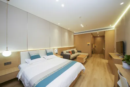Shanxi Yongjin Zhineng Serviced Apartment Hotel (Nandajie) Отели в г. Цзиньчен