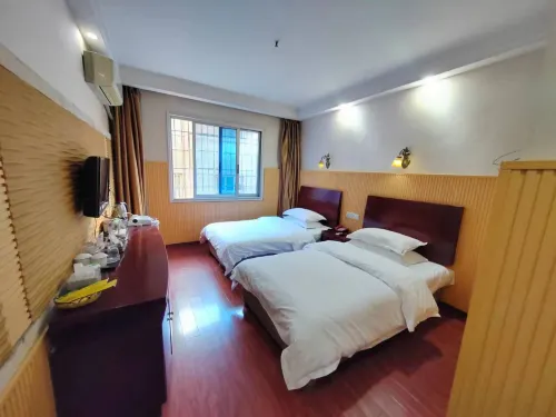 Wusheng Chengbei Business Hotel - Kæledyr tilladt
