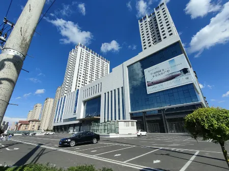 Mingge Apartment (Harbin Sunac Paradise Sun Island) Отели рядом с достопримечательностью «Harbin Far East Institute of Technology»