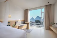 Yangshuo Antiya Hotel (Yulonghe Shili Gallery Store)