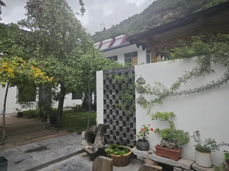 Huguan Youyicun Inn Отели в г. Хугуань