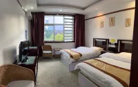 Weixi Weifeng Business Hotel