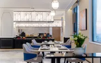 Jinjiang Metropole Hotel (Xinyang Gushi Government Square Branch) - พร้อมอาหารเช้า