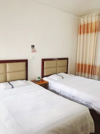 Asbestos Shunxiang Inn Отели рядом с достопримечательностью «SiChuan YaAnShi ShiMianXian BuXingJie»