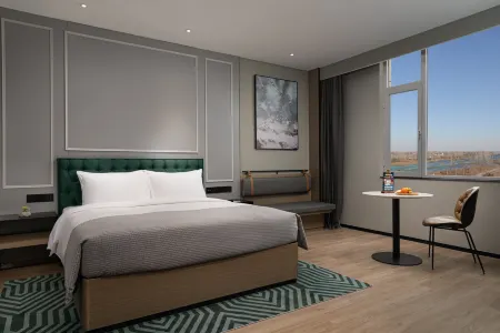 WANDA MOMENTS Отели в г. Юнчэн