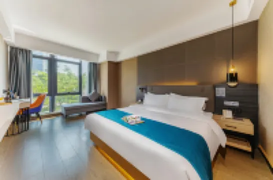 โรงแรมโพแมน (สาขา สวนหงเฉียว เซินเจิ้น & สถานีกวงหมิงเฉิง) โรงแรมใกล้สถานีกวนมิงเชิง