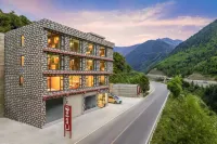 Siguniangshan Xueling Qingju Hotel