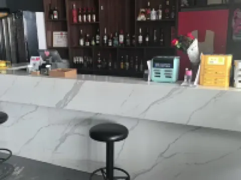 Xiaoshihou Homestay (Wanda Plaza) Hotel a Jingyang