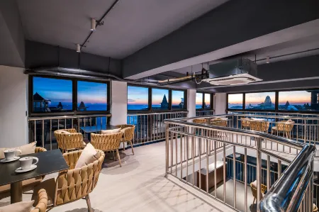 Yunju Hotel (Qiaogang Beach Branch, Beihai Silver Beach District) Отели рядом с достопримечательностью «Guantouling Sightseeing Platform»