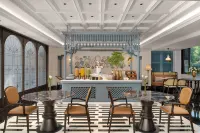 Luoyang Wanda Jinhua Hotel · Longmen Chinese Inn - Morgenmad