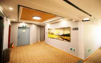 Jinhao Business Hotel (Wuchuan Aoyuan Plaza)