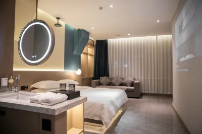 Hualu Wisdom Hotel (Jixi Wanda Plaza Branch) Hoteles cerca de Heilongjiang Institute of Technology