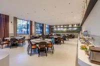 Elong ETANG Hotel (Zhoukou Chuanhui District Wuyi Wenhua Square) فنادق في جَوكَو