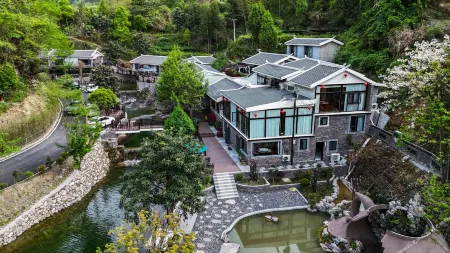 Xingfu Nongzhuang Homestay Отели рядом с достопримечательностью «Tianmen Mountain National Forest Park»