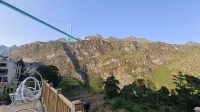 Xiaohuajiang Riverside Tinglan Homestay (Huajiang Grand Canyon Bridge) - Mountain view