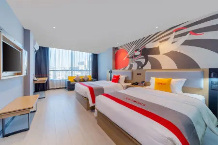 Junyi Hotel Chain (Zhaoqing Huaiji Yuejing Kangcheng Branch) Отели рядом со станцией Huaiji Railway Station