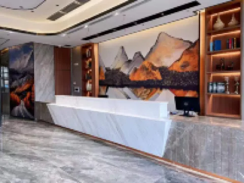 Meidashangpin Hotel (Huichang Bus Station Sunshine Auto City)