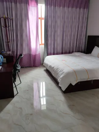 Huanghao Hotel Отели рядом с достопримечательностью «Xiluodu Times Square»